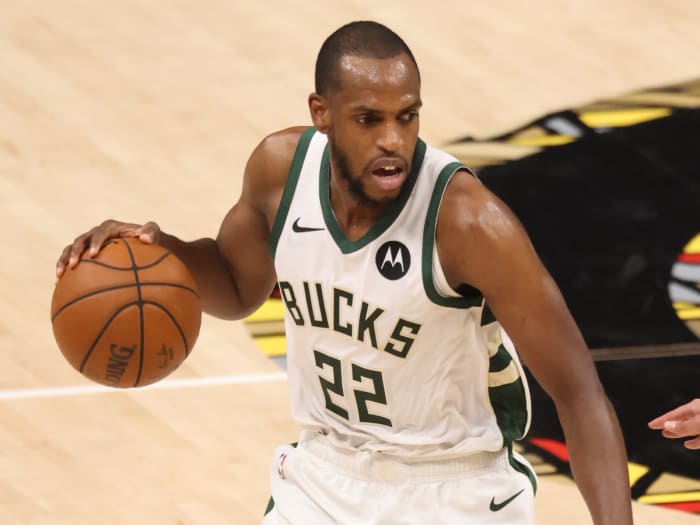 Milwaukee Bucks forward Khris Middleton (22) dribbles the ball
